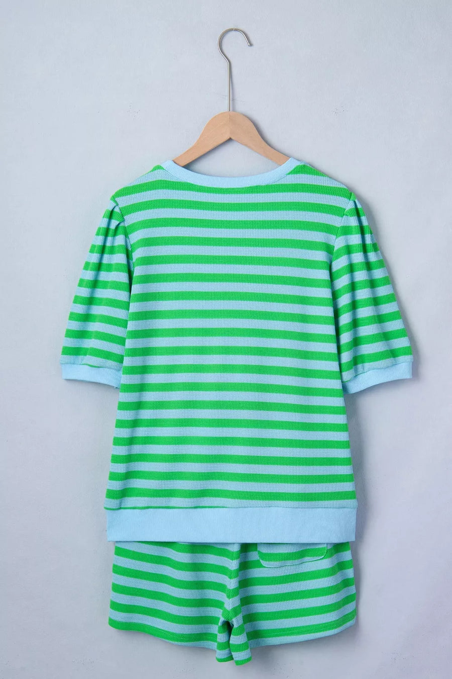 Striped knit top and shorts set in green and light blue with short sleeves and a crew neck.