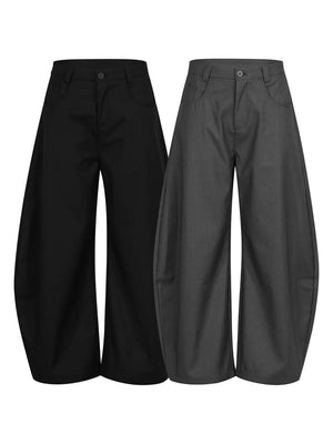 Voluminous wide-leg sweatpants in black and grey with a comfortable, casual fit.