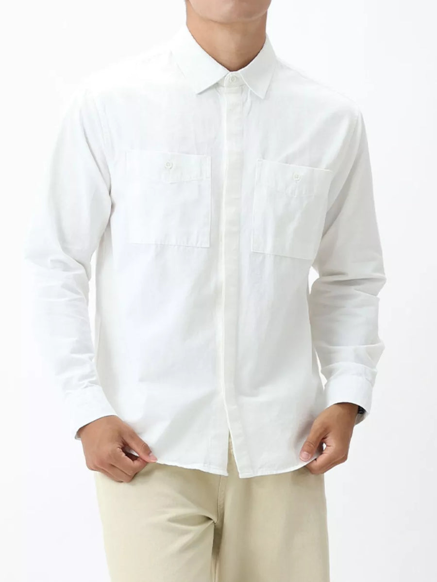 Men's white cotton button-down shirt with two chest pockets and a classic collar.