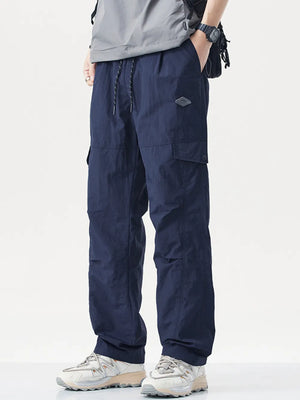 Navy blue relaxed fit cargo sweatpants with drawstring and pockets