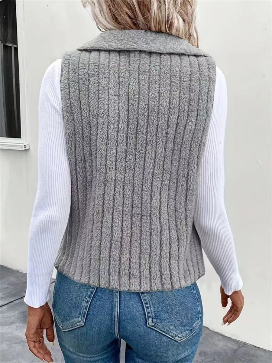Gray ribbed fleece vest with a collar, open front, and collar detail.