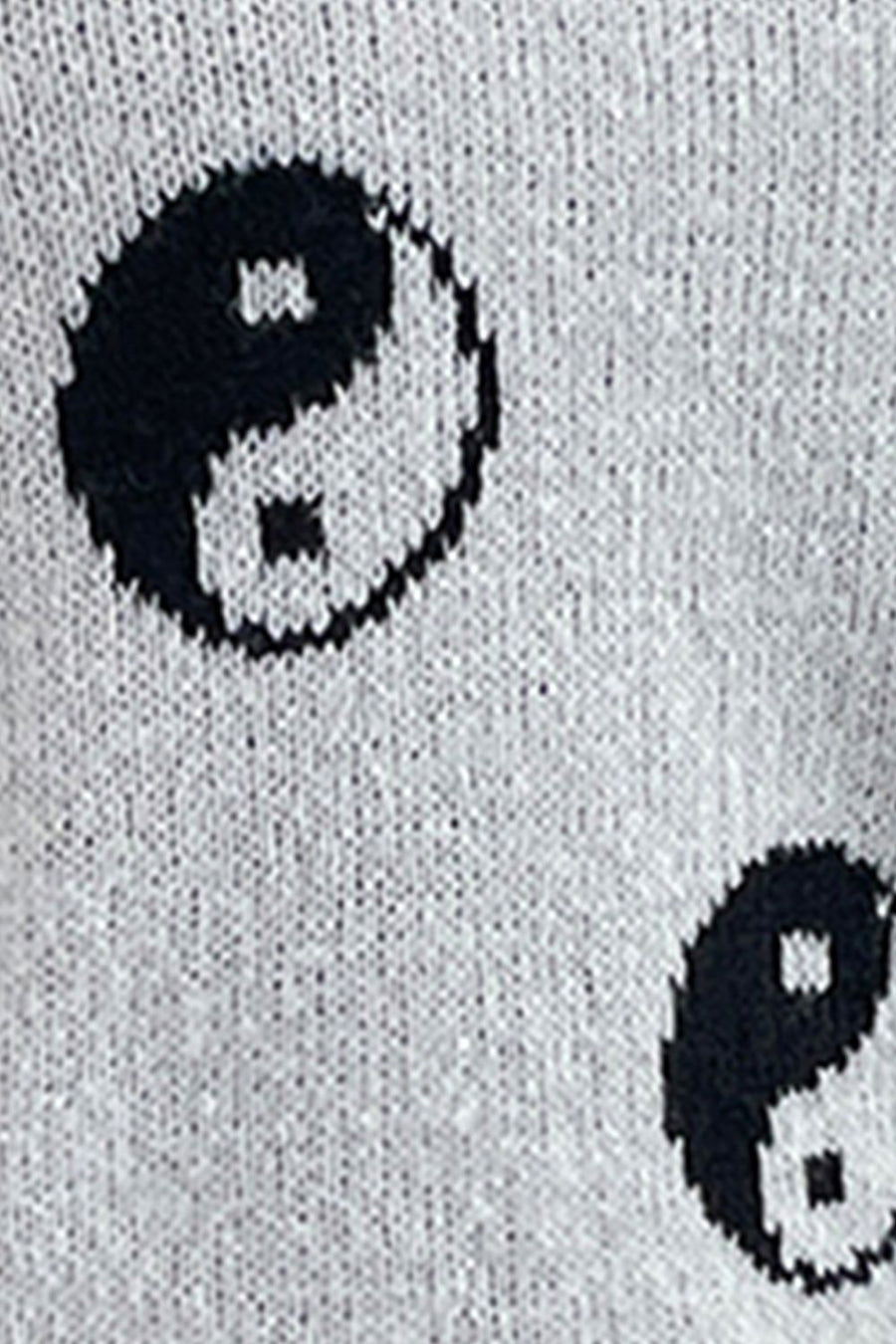 Light gray acrylic knit sweater with black yin yang pattern