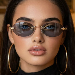 sunglasses in dark gray featuring UV400 protection and oval fit