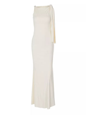 Apricot asymmetrical draped maxi dress with one shoulder and elegant neckline.