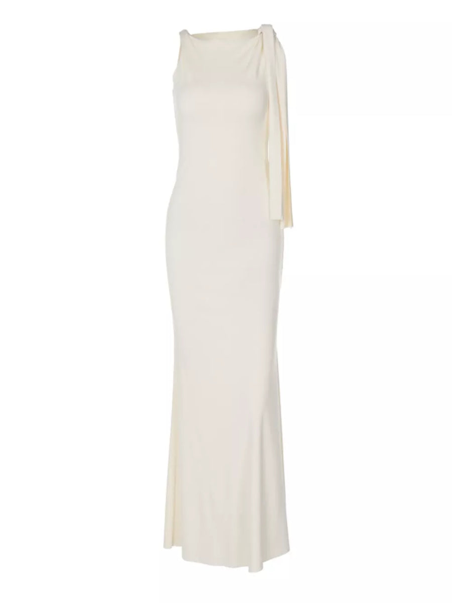 Apricot asymmetrical draped maxi dress with one shoulder and elegant neckline.