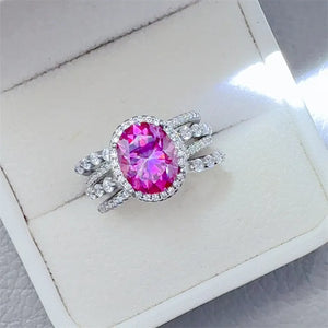 Radiant Halo & Stacked Gem Ring in silver with a bright pink oval center stone and diamond accents.