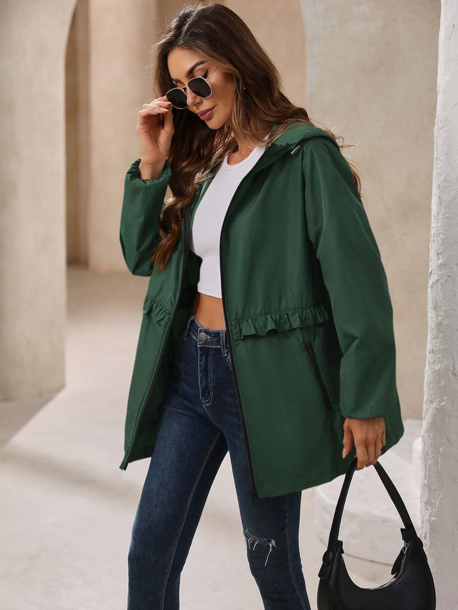 Dark green hooded windbreaker jacket with ruffled waistline and zip pockets