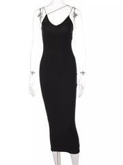 Black midi dress with spaghetti straps and deep V-neck.