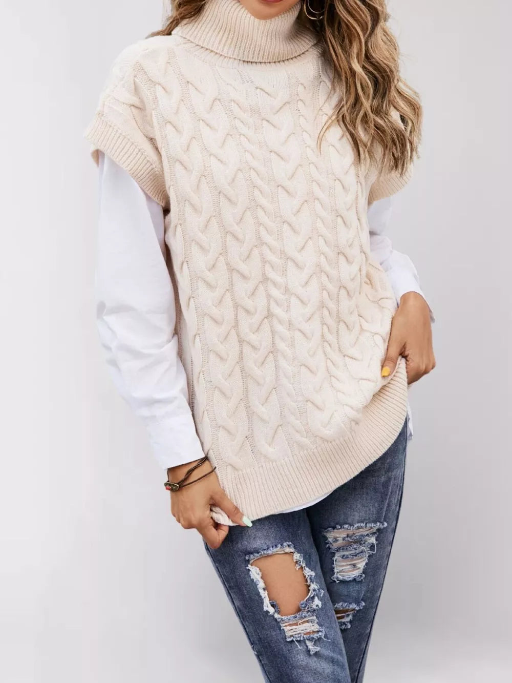 ivory sweater vest with cable knit and turtleneck