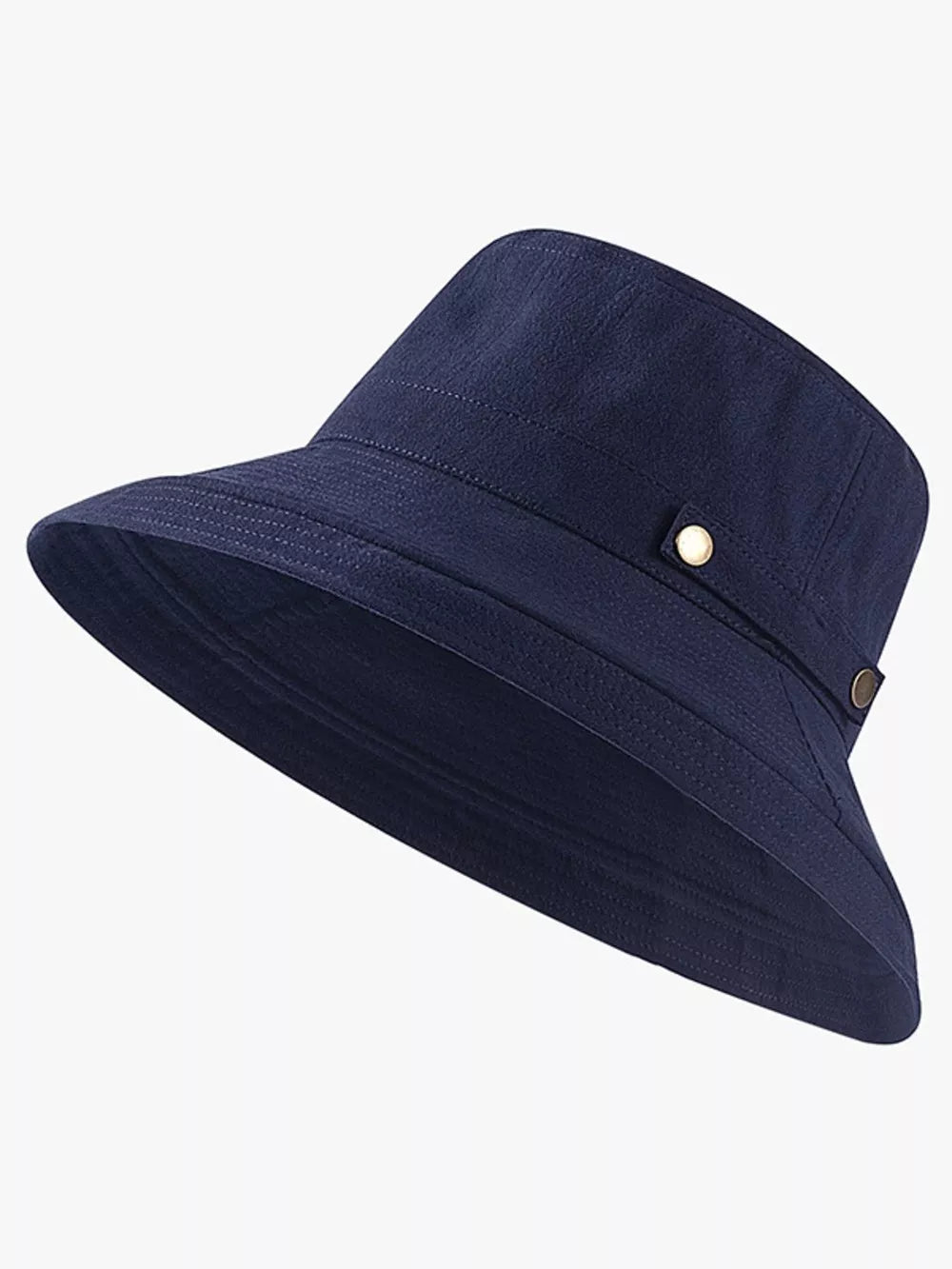 Dark navy cotton bucket hat with wide brim and brass hardware detail.