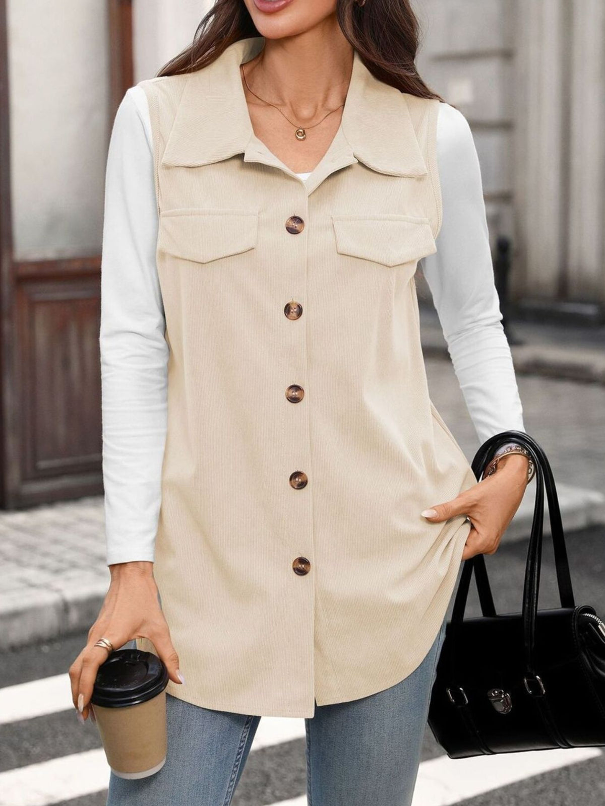 100% polyester Care instructions: Machine wash cold vest in Black with relaxed silhouette