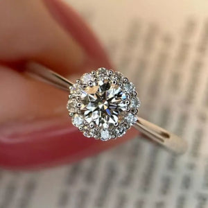ring in clear with floral and moissanite