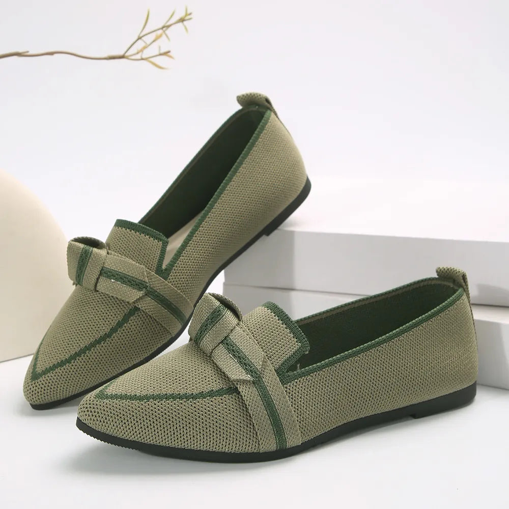 Olive knit bow loafers with pointed toe and contrast trim.