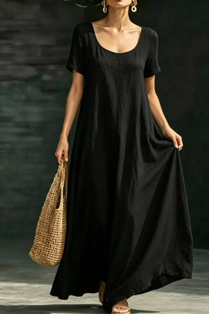 Black polyester maxi dress with short sleeves, scoop neck, and hidden pockets.