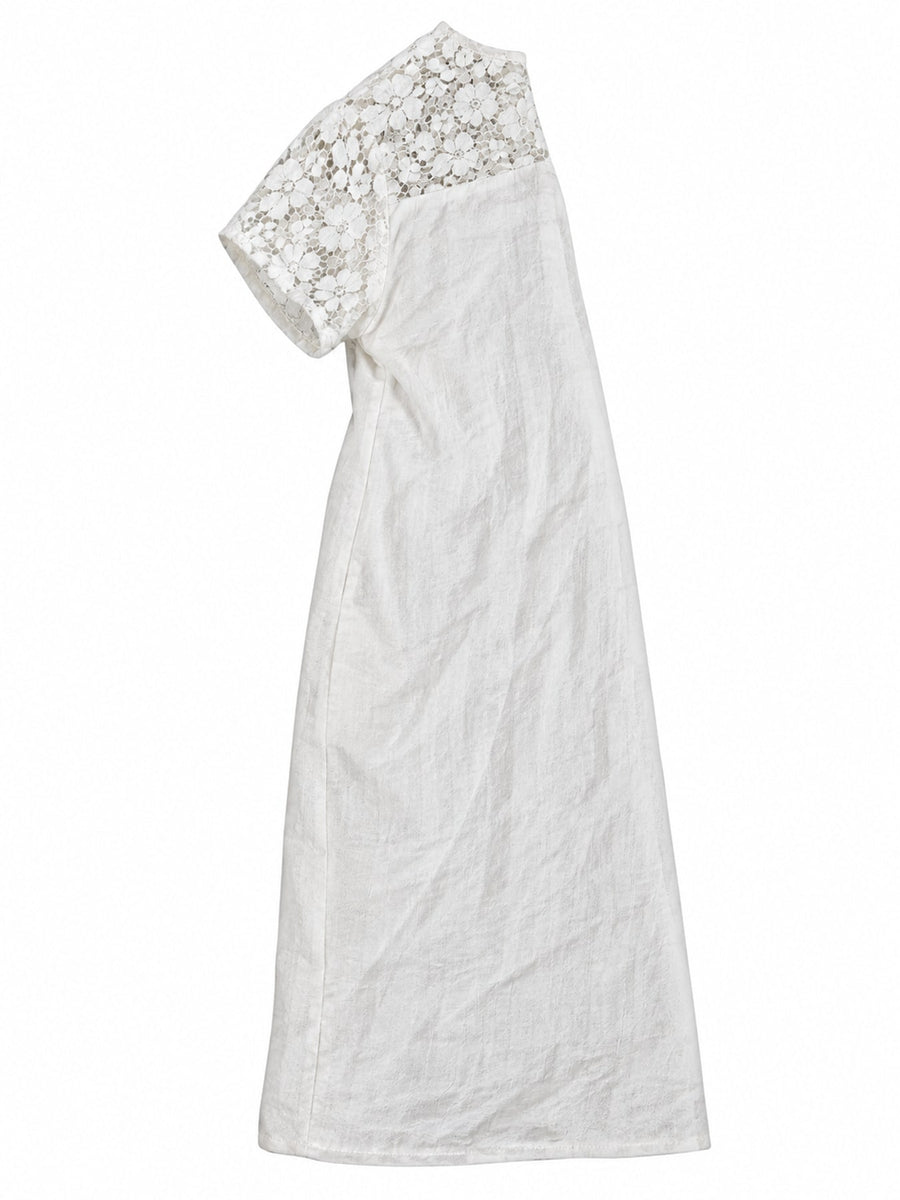 White shift dress featuring lace detail and floral