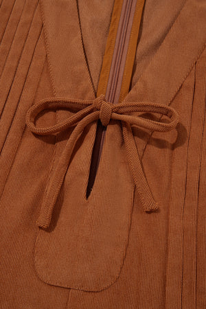 Solid Color Tie V Neck Sleeveless Corduroy Romper in rust with tied