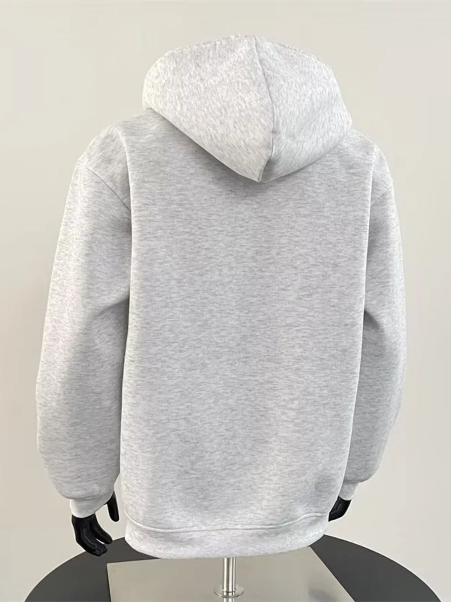 Grey cotton blend hoodie with a relaxed fit and hood.