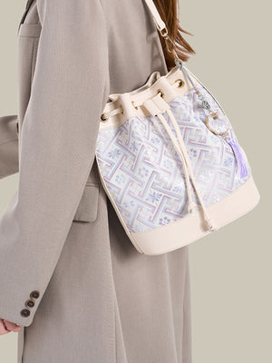 PU Leather Imported Size &amp crossbody bag in White with bucket silhouette