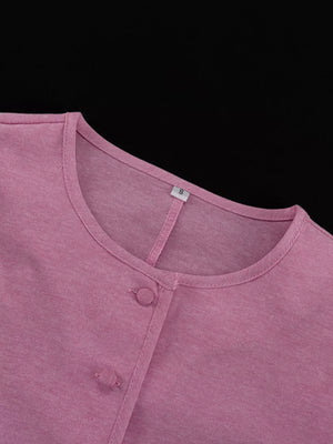 Pink cotton blend button-front shirt with crew neck and short sleeves