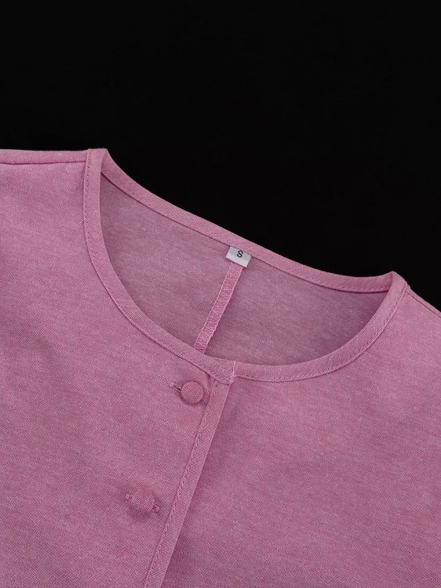 Pink cotton blend button-front shirt with crew neck and short sleeves