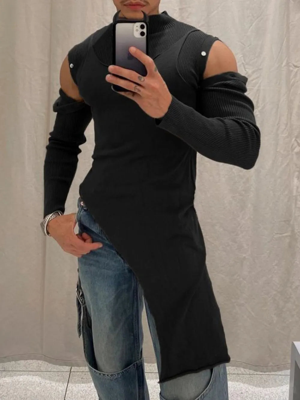 Black ribbed cutout top with detachable sleeves and asymmetric hem