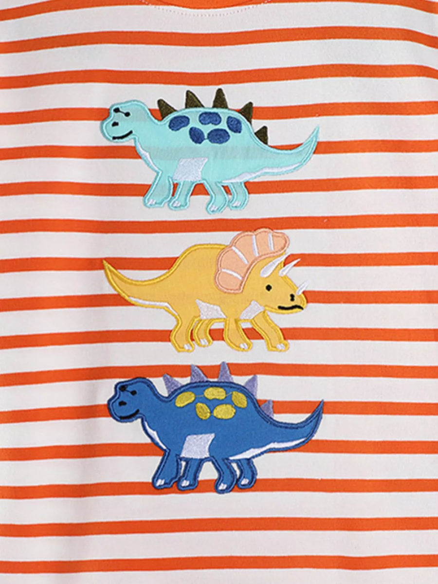 Baby tee with multicolor dinosaur appliques on orange and white stripes