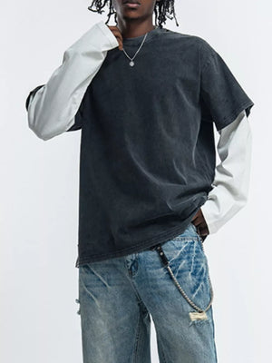 Men's black fake two-piece long sleeve t-shirt with white undersleeve.