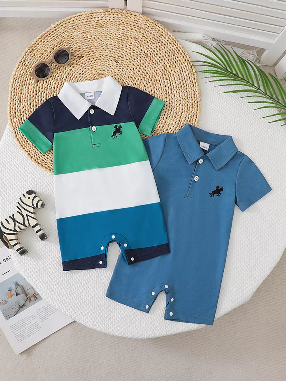 Color block polo romper for baby boys with horse embroidery, featuring navy, green, white, and blue stripes.