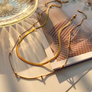 gold necklace with layered and clasp