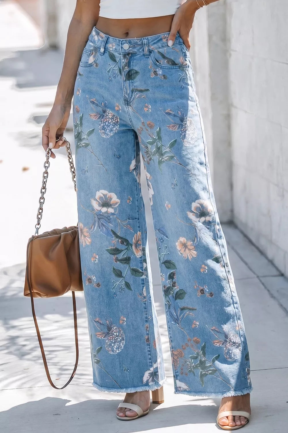 wide-leg jeans in light blue featuring pocketed and flared fit