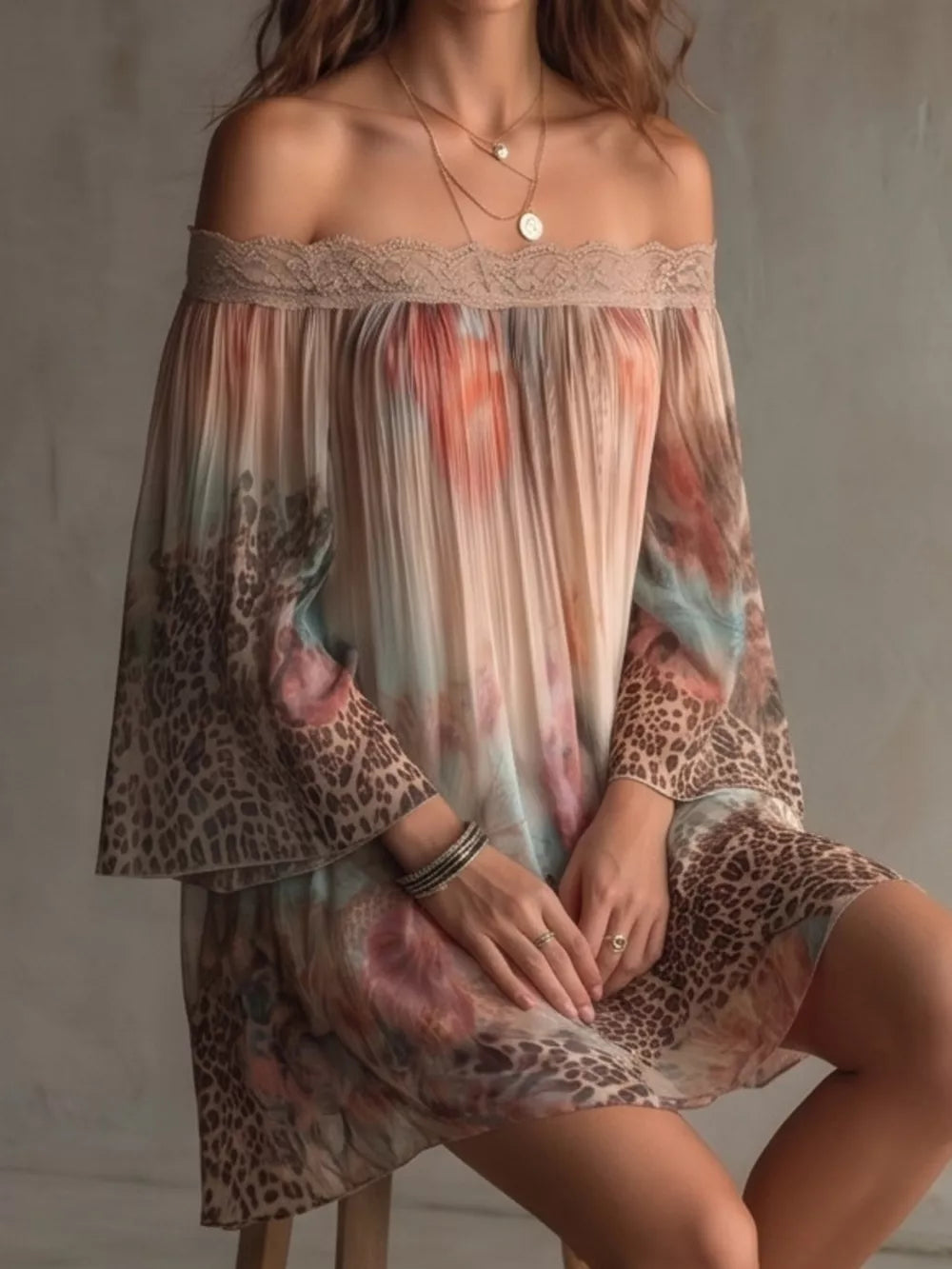 coral pink mini dress featuring lace detail and floral