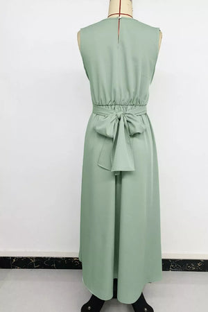 Light green sleeveless high-low a-line dress with ruched waist and bow detail