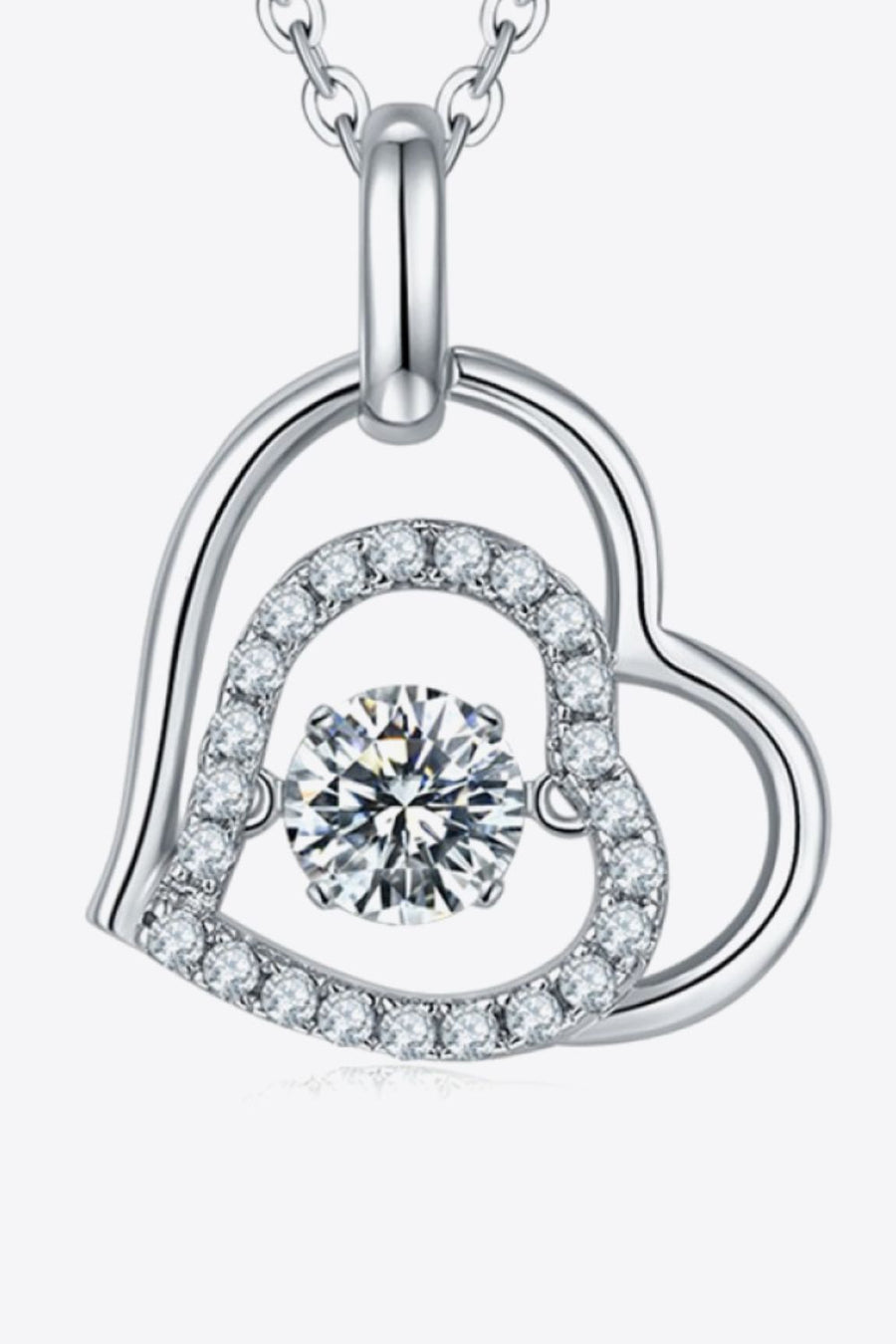 Silver floating heart necklace with pave diamond accents and a central sparkling stone.