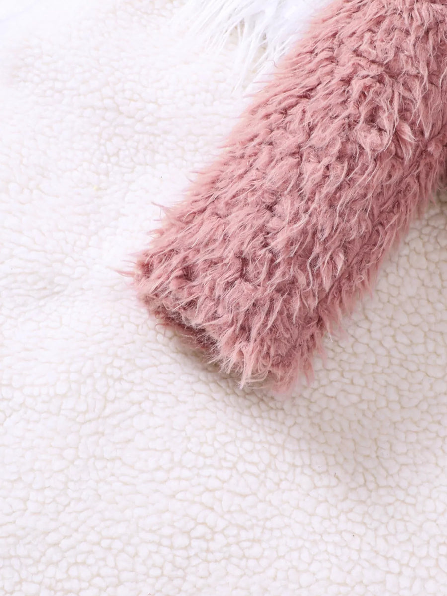 Dusty pink faux fur jacket sleeve detail on white sherpa background