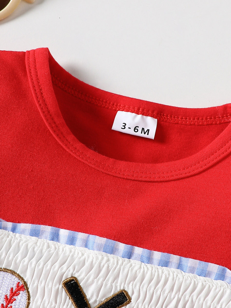Red baseball graphic tee with smocked white fabric and blue gingham trim.