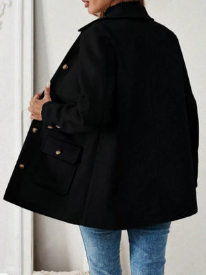 Black button-front trench coat with flap pockets and gold buttons.