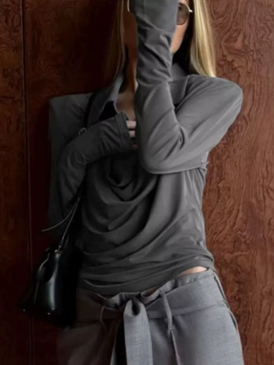 95% Rayon 5% Spandex Care instructions: Machine wash cold blouse in charcoal with slim silhouette