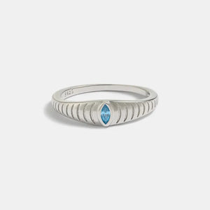 Silver grooved band ring with marquise aquamarine stone