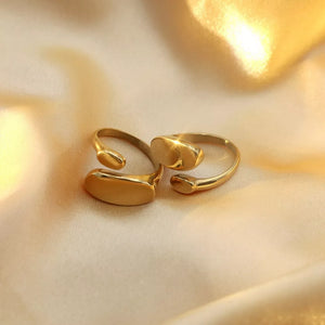 18K Gold-Plated,Titanium Steel Care instructions: Avoid wearing during exercise, ring in Gold with bypass silhouette