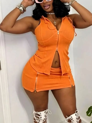 Orange hooded zippered two-piece set with mini skirt and zip details