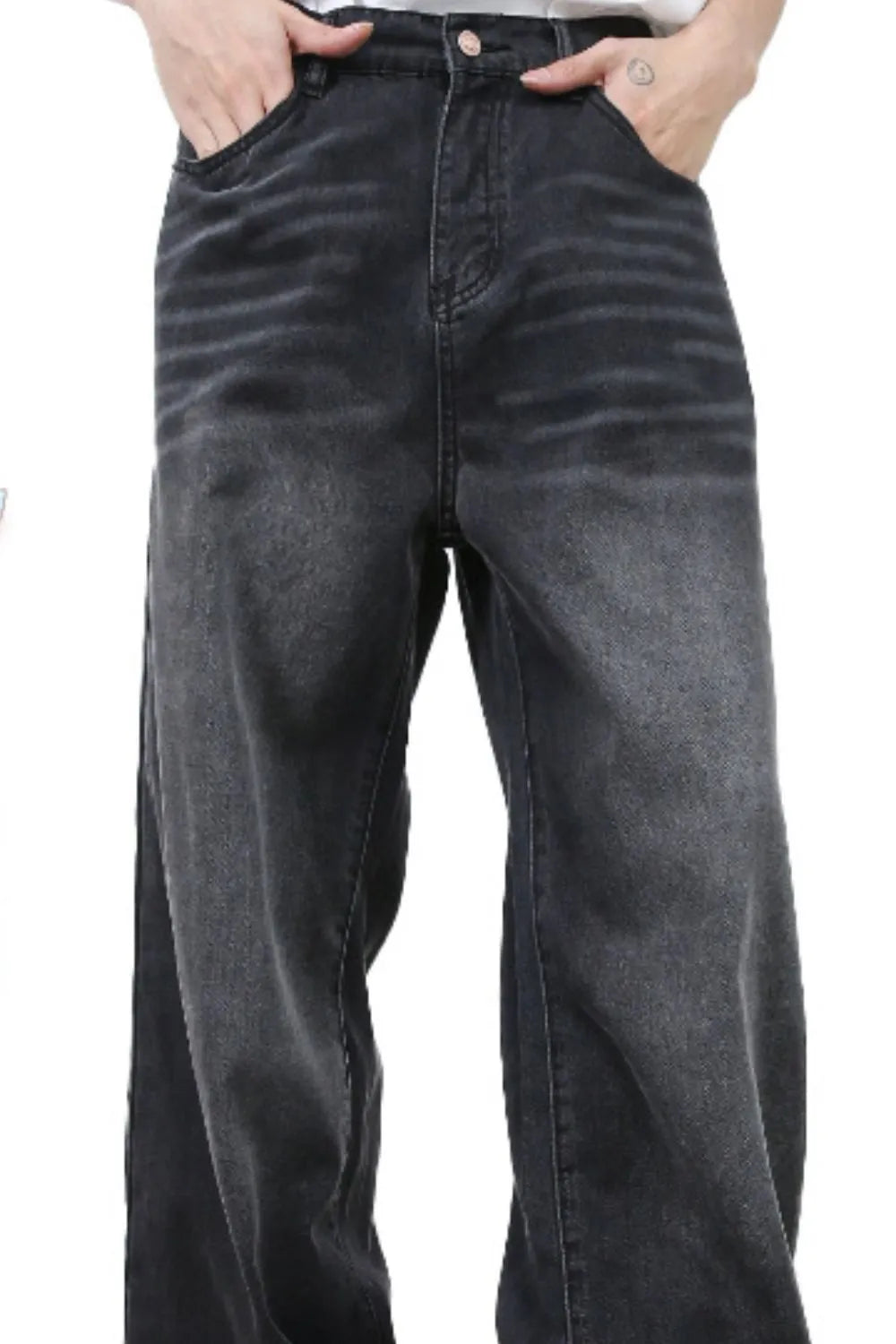 Feline Whisker Denim Jeans in dark gray, featuring a relaxed fit and subtle whiskering details.
