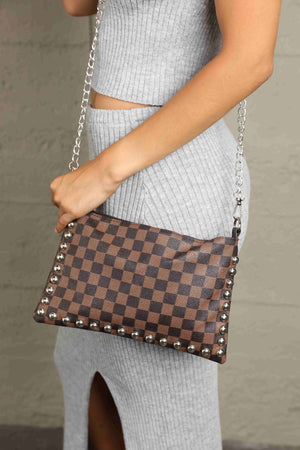 Brown checkered print studded shoulder bag with silver chain strap