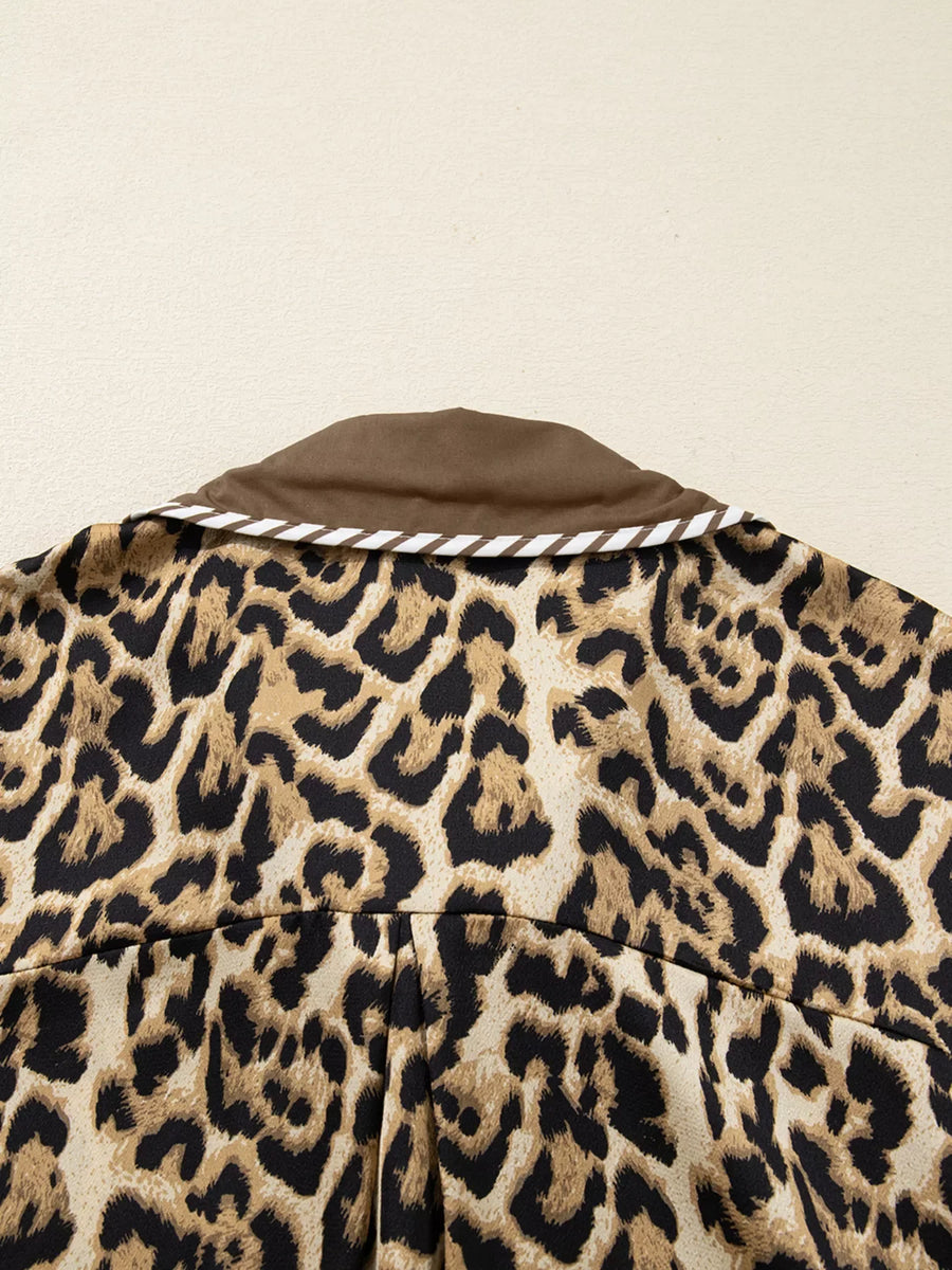 Leopard print buttoned shirt with brown collar and white stripe trim