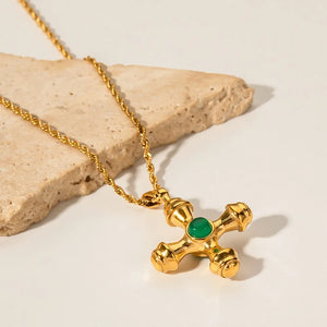 Gold Byzantine cross pendant necklace with green gemstone detail