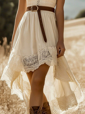 Cream lace trim high-low dress with brown belt and cutout detail.