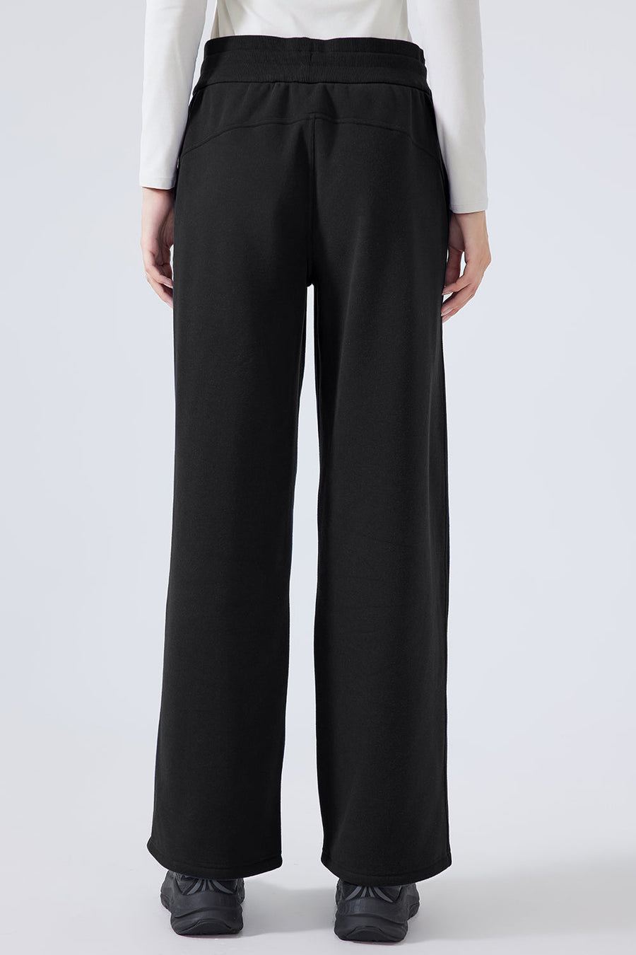 Black relaxed palazzo sweatpants with drawstring waist and wide leg