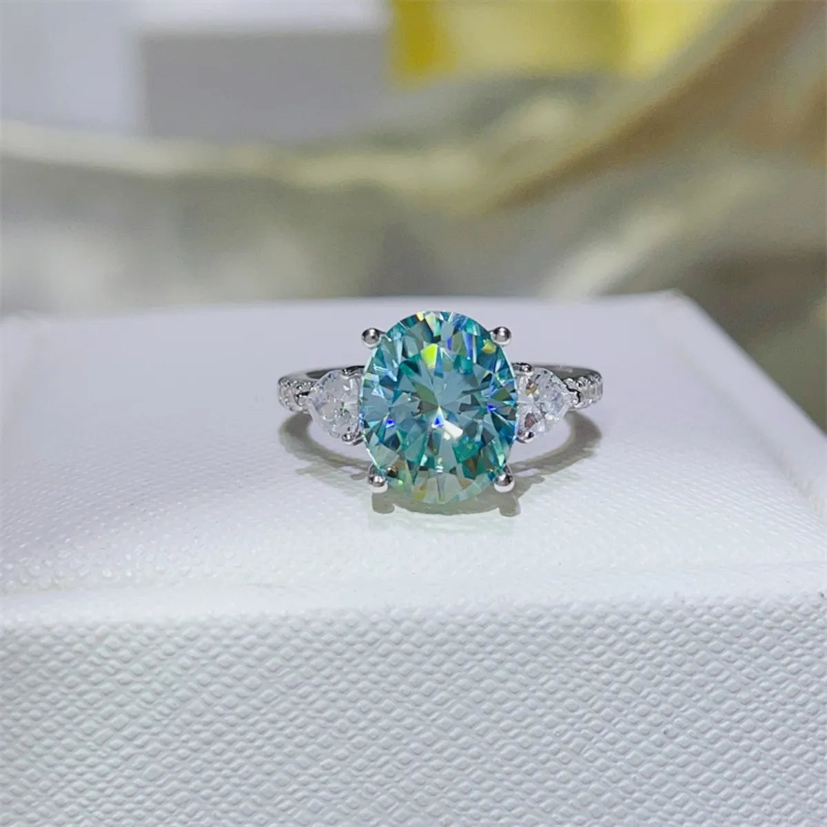 Turquoise oval moissanite trilogy ring in 925 sterling silver with pave accents