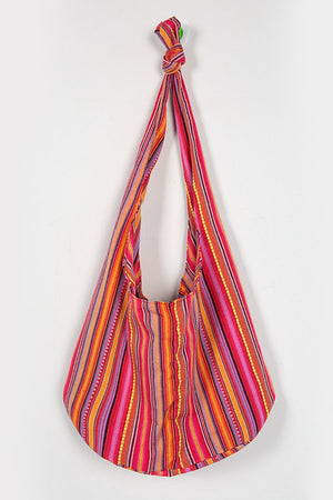 Tribal Weave Shoulder Bag in multicolor striped canvas with yellow embroidered detail.
