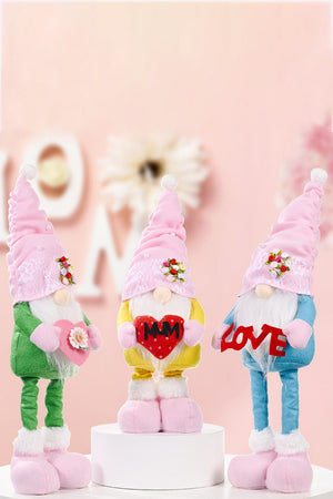 Embroidered garden gnomes in green, yellow, and sky blue holding hearts and the word LOVE.