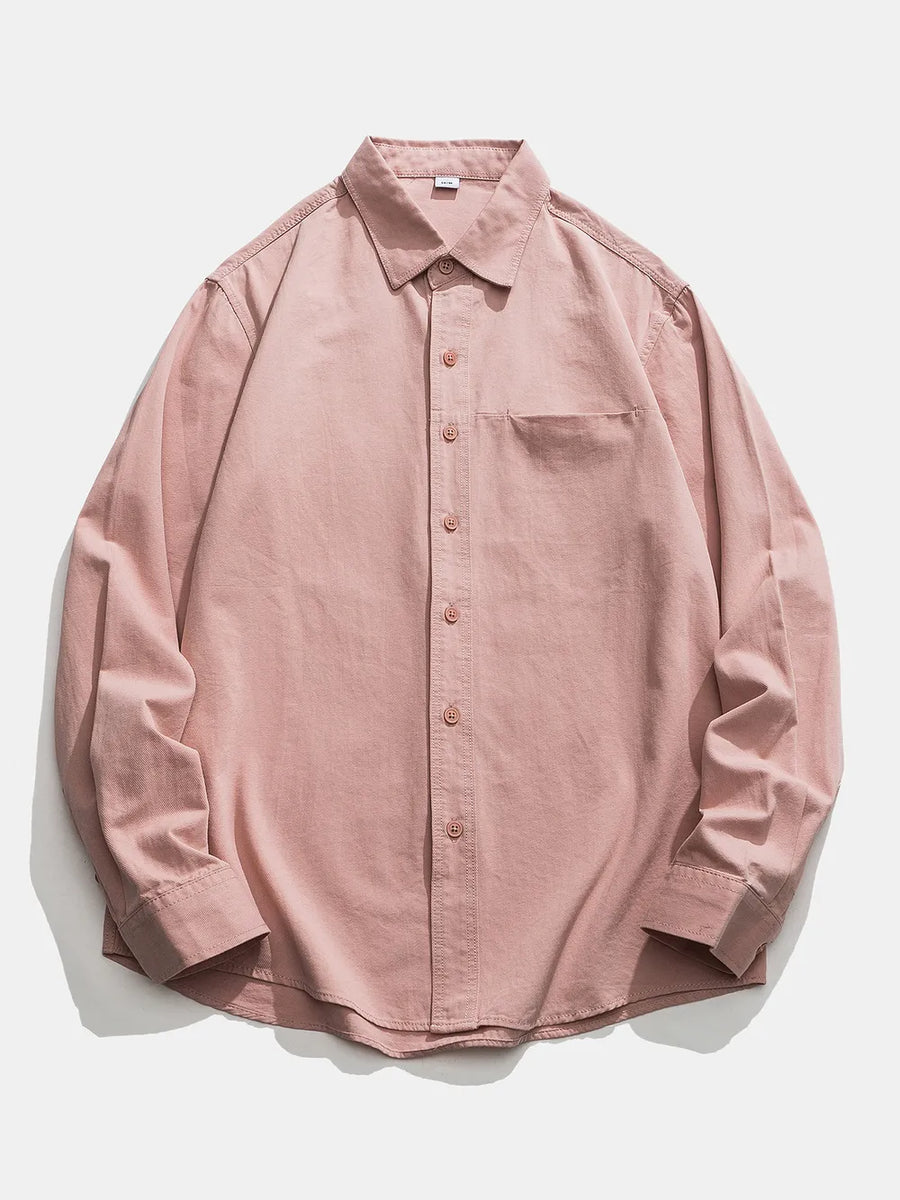 Classic button-down men's shirt in pink cotton with a chest pocket.